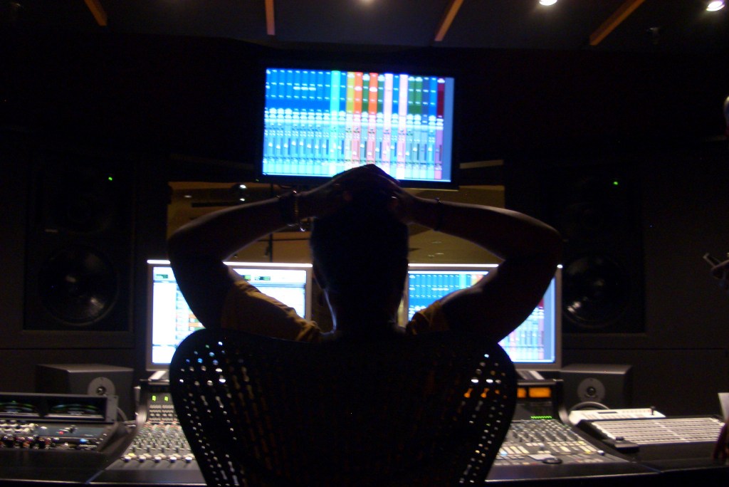 Nana D. Kufuor listens to a mix